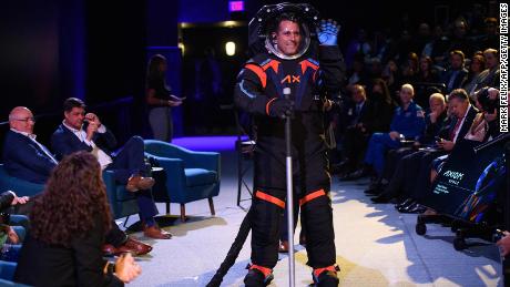 Chief Engineer Jim Stein wears the new spacesuit during the Axiom Space Artemis III Lunar Spacesuit event at Space Center Houston in Houston, Texas, on March 15, 2023. - &quot;Since a spacesuit worn on the Moon must be white to reflect heat and protect astronauts from extreme high temperatures, a cover layer is currently being used for display purposes only to conceal the suits proprietary design, &quot; Axion said in a press release. (Photo by Mark Felix / AFP) (Photo by MARK FELIX/AFP /AFP via Getty Images)