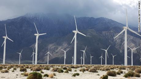 Wind turbines operate at a wind farm, a key power source for the Coachella Valley, on February 22, 2023 in Palm Springs, California. 