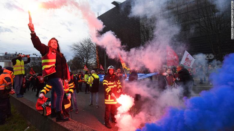 See footage of France protesters setting fires around Paris