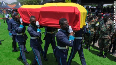 Pallbearers carry the coffin of the late Ghanaian footballer Christian Atsu.