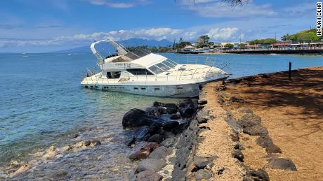 Officials in Hawaii  said they would remove grounded boat &quot;by any means necessary&quot; to avoid damaging a culturally significant site, the state Department of Land and Natural Resources said.