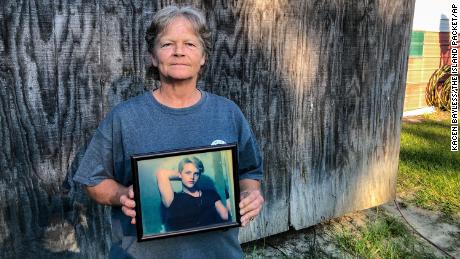 Sandy Smith holds a photo of her late son, 19-year-old Stephen Smith, on Thursday, June 24, 2021.