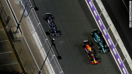 Red Bull&#39;s Sergio Perez, Aston Martin&#39;s Fernando Alonso, Mercedes&#39; George Russell and Ferrari&#39;s Carlos Sainz in action during the race.