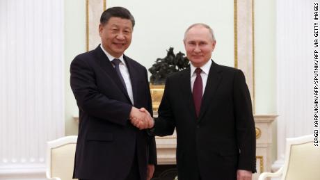 TOPSHOT - Russian President Vladimir Putin meets with China&#39;s President Xi Jinping at the Kremlin in Moscow on March 20, 2023. (Photo by Sergei KARPUKHIN / SPUTNIK / AFP) (Photo by SERGEI KARPUKHIN/SPUTNIK/AFP via Getty Images)