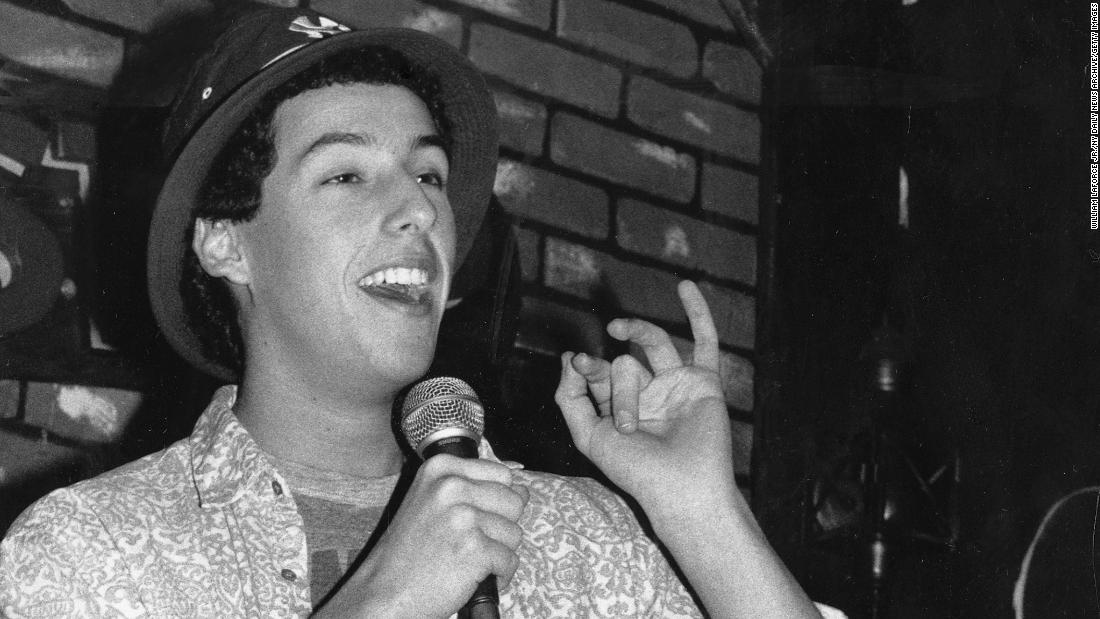 Sandler does a standup routine at the Comic Strip in New York in 1987.