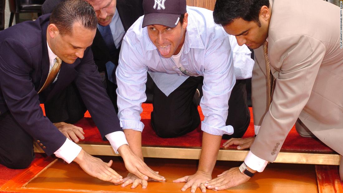 Sandler leaves his handprints at the famous Grauman&#39;s Chinese Theatre in Hollywood in May 2005.