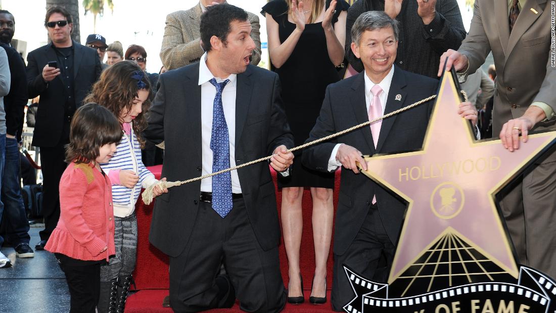Sandler is joined by his daughters, Sunny and Sadie, as he is honored with a star on the Hollywood Walk of Fame in 2011.