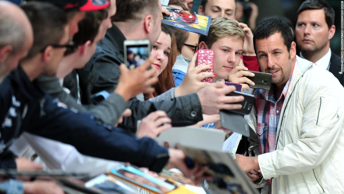 Sandler greets fans in Berlin at the premiere of the film &quot;Blended&quot; in 2014.