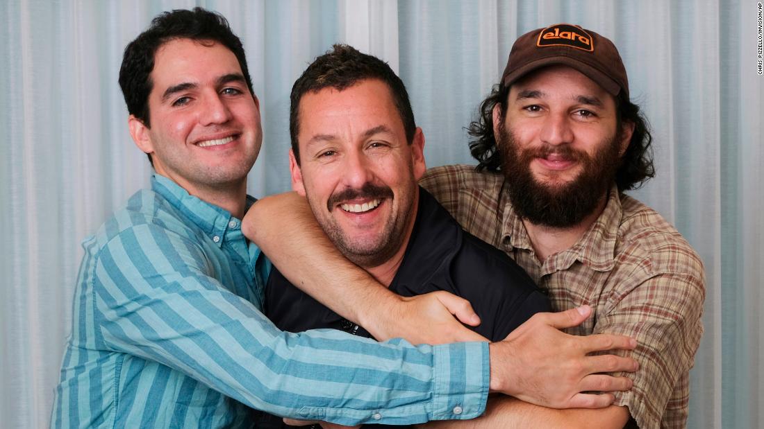 Sandler poses for a portrait with his &quot;Uncut Gems&quot; co-directors Benny and Josh Safdie in September 2019. Sandler received critical acclaim for his performance and later won the Independent Spirit Award for best male lead. 