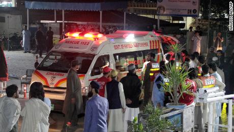 Rescue worker unload earthquake victims from an ambulance at a hospital in Saidu Sharif, a town in Pakistan&#39;s Swat Valley on March 21.