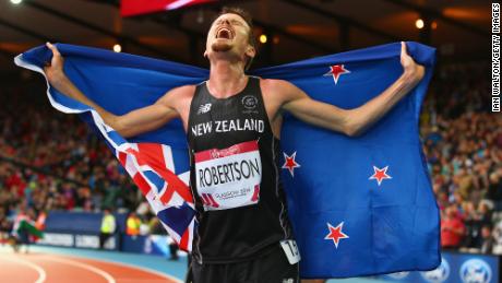 Robertson celebrates winning bronze in the 5,000 meters at the 2014 Commonwealth Games. 