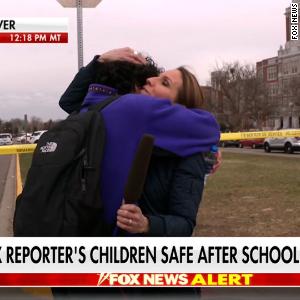 Fox News reporter hugs her son on air after he comes out of school shooting