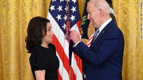 TOPSHOT - US President Joe Biden awards actress Julia Louis-Dreyfus with the 2021 National Medal of Arts during a ceremony in the East Room of the White House in Washington, DC, March 21, 2023. (Photo by SAUL LOEB / AFP) (Photo by SAUL LOEB/AFP via Getty Images)