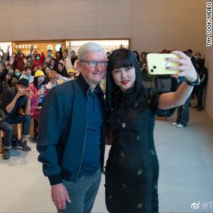 After TikTok chief's grilling in Washington, Apple's Tim Cook is all smiles in Beijing