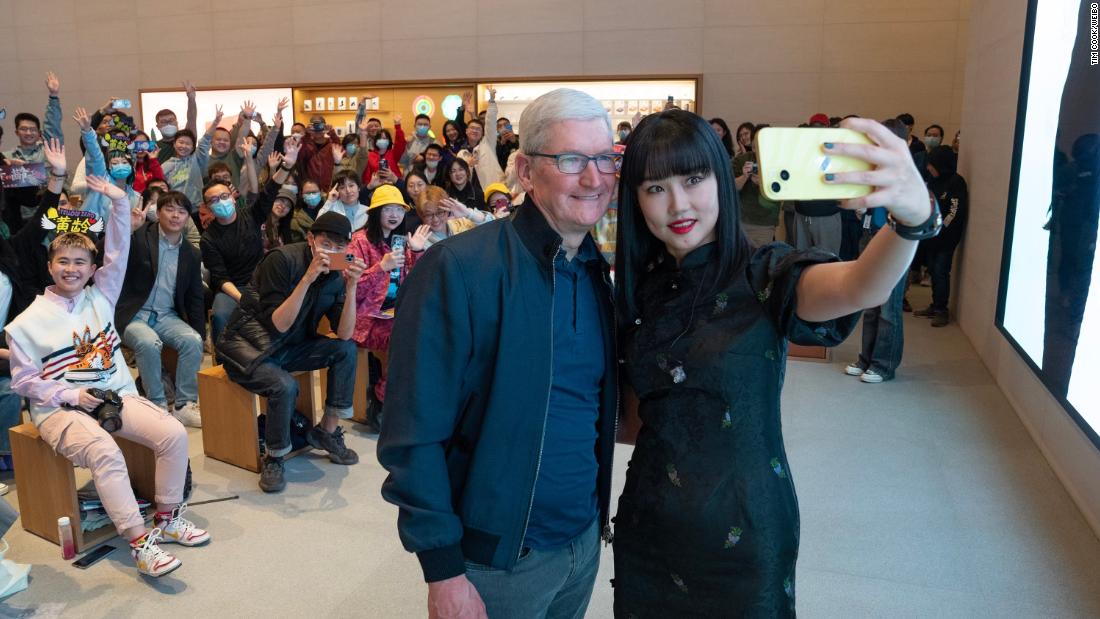 After TikTok chief's grilling in Washington, Apple's Tim Cook is all smiles in Beijing