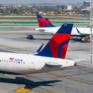 Delta passenger opens door, deploys emergency exit slide on plane