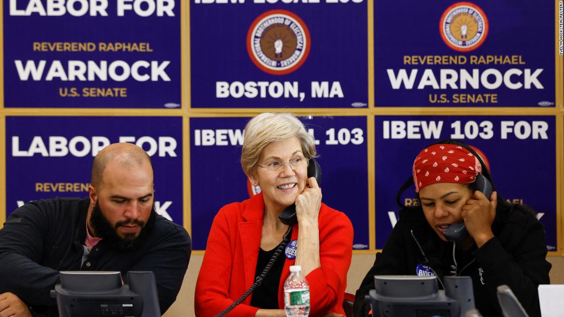 Sen. Elizabeth Warren participates in a phone bank for Sen. Raphael Warnock with the International Brotherhood of Electrical Workers in Boston in December 2022.
