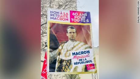A poster of President Emmanuel Macron is waved at protests in Paris on Tuesday. It reads, &quot;No to Macron&#39;s retirement. 60 for all. Macron despising the republic.&quot;