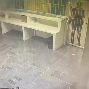 Video shows detainees locked behind gates as fire breaks out in detention center