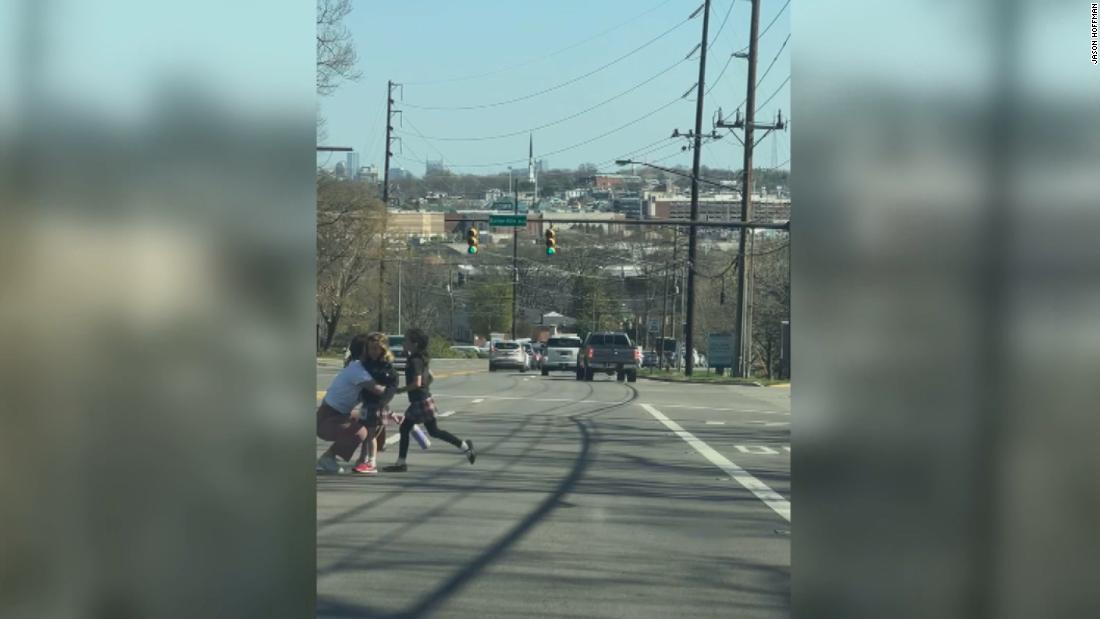 New video shows kids running across street away from shooting