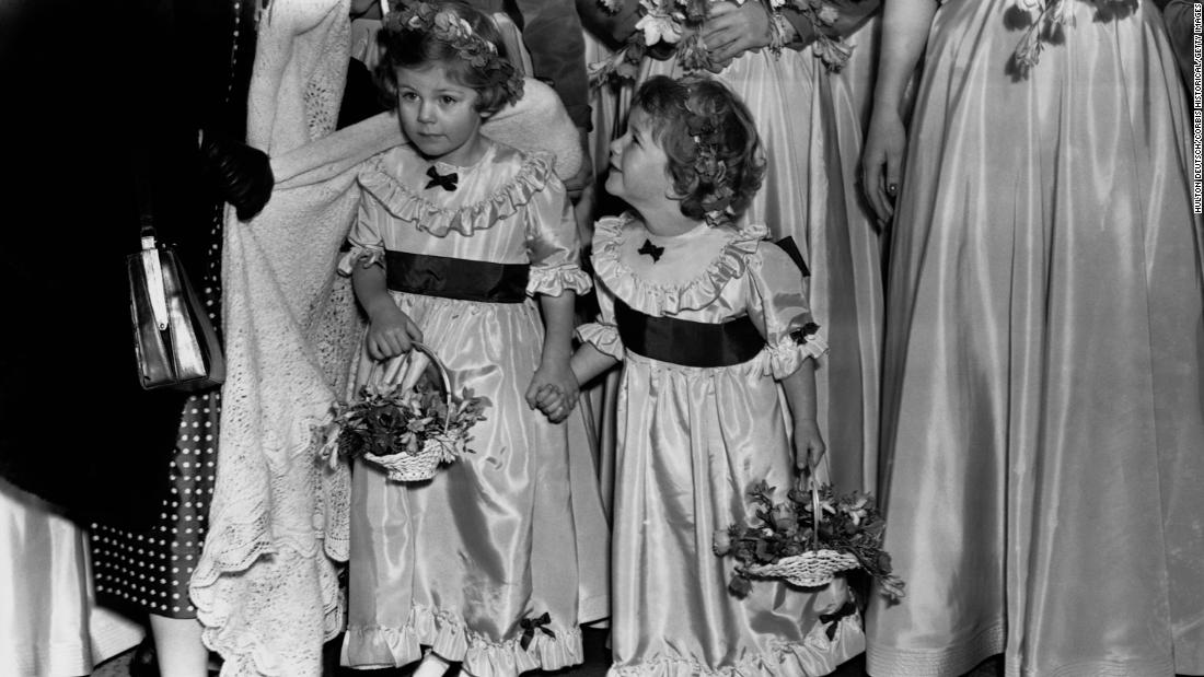 Camilla and her younger sister, Annabel, serve as bridesmaids at the wedding of their uncle Jeremy Cubitt and actress Diana Du Cane in 1952. Camilla was born on July 17, 1947. Her father, Bruce Shand, was a retired British Army officer who later became a wine merchant. Her mother, Rosalind Cubitt, was the daughter of the 3rd Baron of Ashcombe.