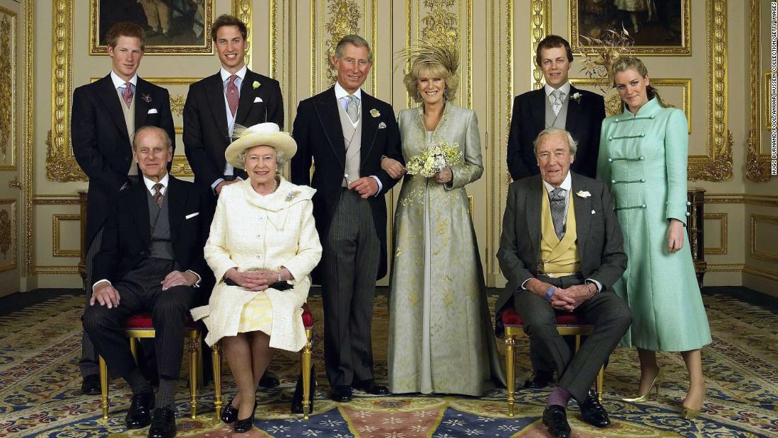 Camilla and Charles pose for a wedding photo with their children and parents in April 2005. On the left are Charles&#39; sons Prince Harry and Prince William and his parents, Prince Philip and Queen Elizabeth II. On the right are Camilla&#39;s children Laura and Tom and her father, Bruce.