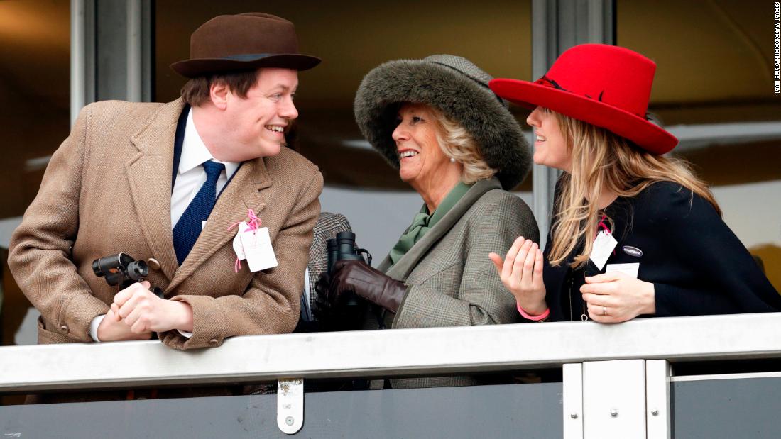 Camilla and her children, Tom and Laura, watch horse races at the Cheltenham Festival in March 2015.
