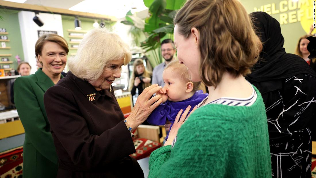 The Queen Consort visits Refugio Berlin and speaks with Diana Strassheim and baby Kuno on Thursday.