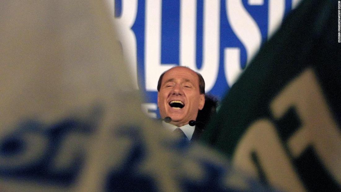 Berlusconi smiles during a rally in Rome in May 2001. Two days later, he won the general election.
