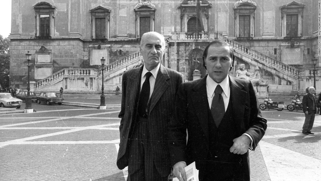Berlusconi, right, with journalist Indro Montanelli in 1977.