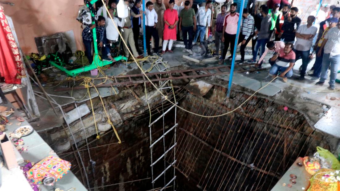 At least 35 killed after falling into underground stepwell in Indian temple