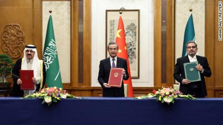 Top Chinese diplomat Wang Yi attends a meeting with Secretary of Iran&#39;s Supreme National Security Council Ali Shamkhani and Minister of State and national security adviser of Saudi Arabia Musaad bin Mohammed Al Aiban in Beijing on March 10. 