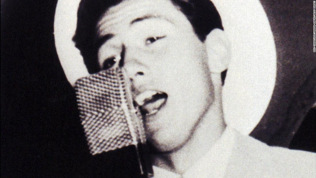 An image from Berlusconi&#39;s book &quot;Una storia italiana&quot; shows him during his early singing career. Berlusconi sent copies of the book to Italian voters ahead of the 2001 election. 
