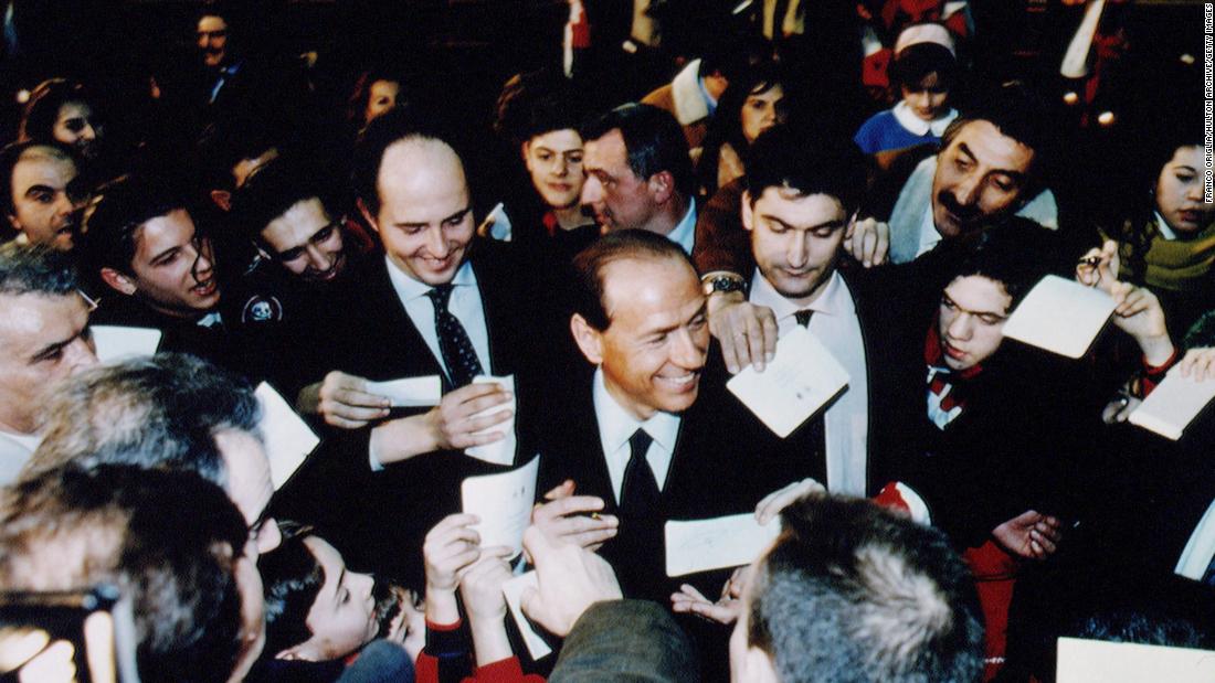 Berlusconi is surrounded by supporters during a rally in Rome in February 1994.