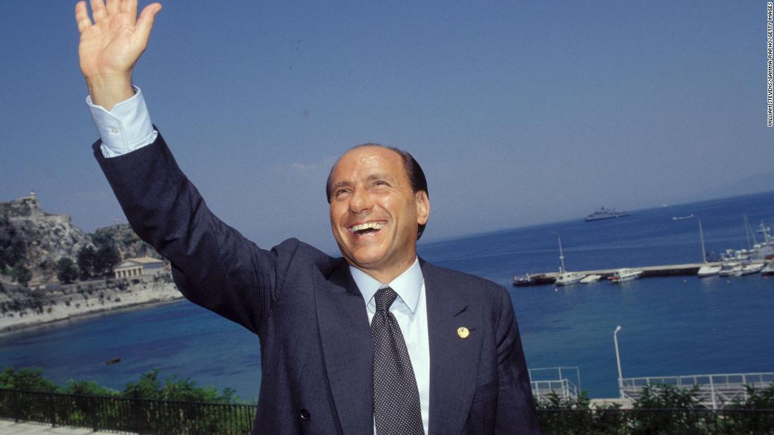 Berlusconi waves while attending a European Council meeting in Corfu, Greece, in June 1994.