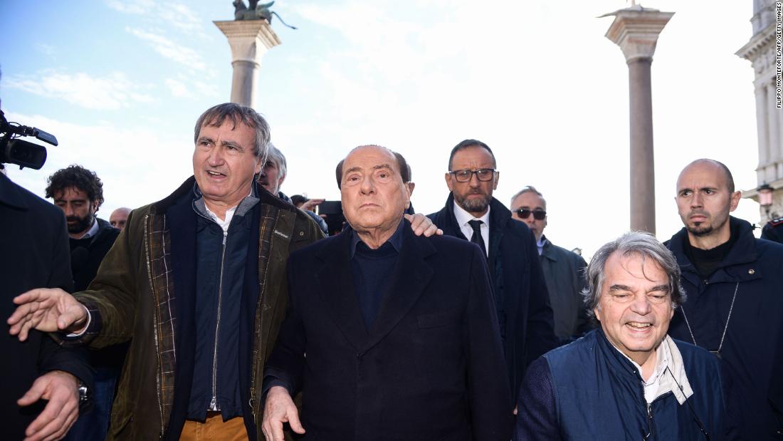From left, Venice Mayor Luigi Brugnaro, Berlusconi and Forza Italia MP Renato Brunetta assess flood damage in Venice, Italy, in 2019.