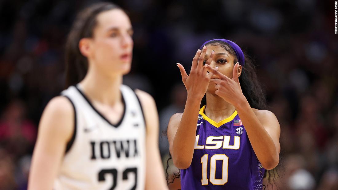 LSU&#39;s Angel Reese gestures toward her ring finger in the final moments of the game.