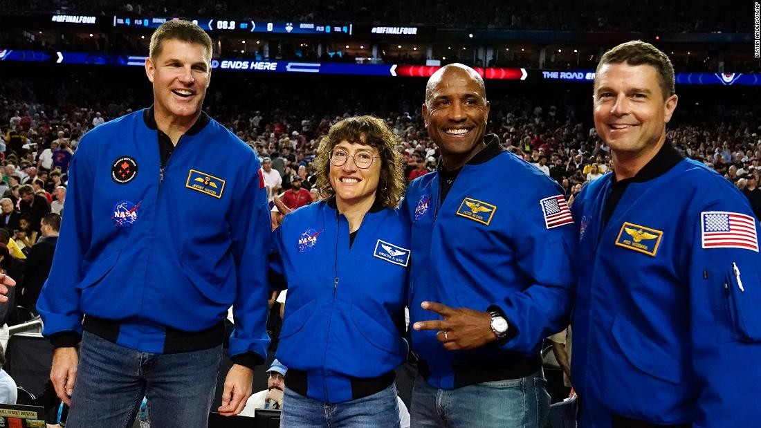 Astronauts for &lt;a href=&quot;https://www.cnn.com/2023/04/03/world/artemis-2-astronaut-crew-scn/index.html&quot; target=&quot;_blank&quot;&gt;the upcoming Artemis II mission&lt;/a&gt; pose for a photo at the game. The crew members, from left, are Jeremy Hansen, Christina Hammock Koch, Victor Glover and Reid Wiseman.