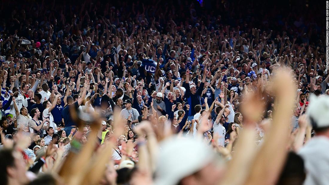 UConn fans celebrate during the first half.