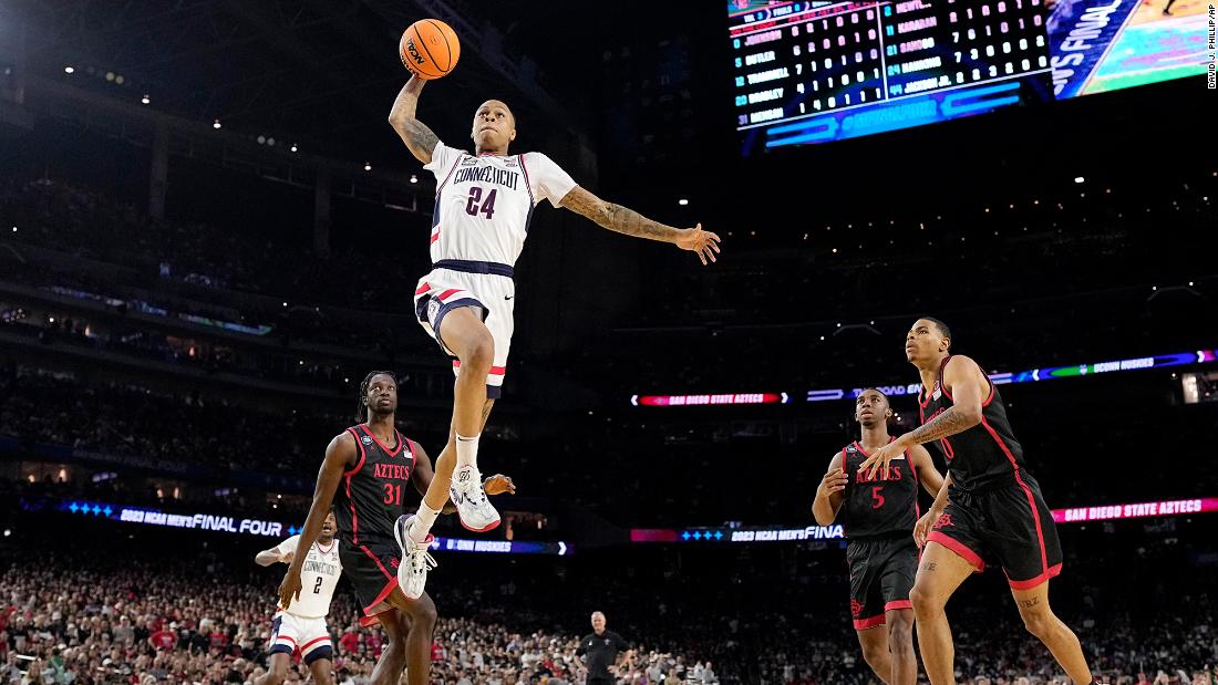 Hawkins attempts a dunk at the start of the second half. It clanged off the back of the rim.