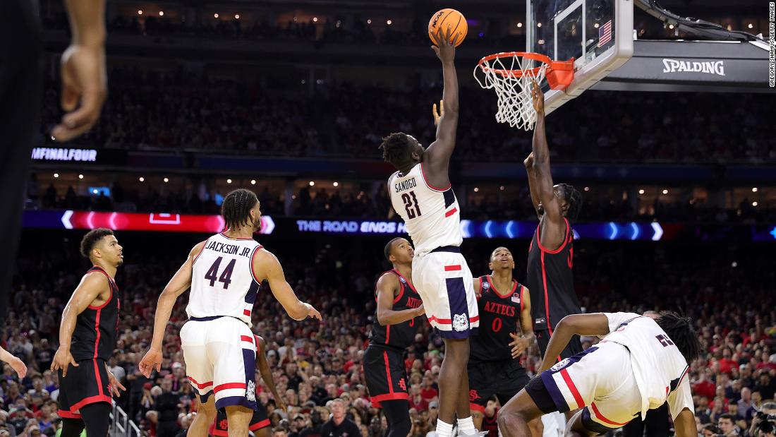 UConn&#39;s Adama Sanogo shoots the ball over Nathan Mensah. Sanogo finished with 17 points and 10 rebounds, and he was later named the tournament&#39;s most outstanding player.