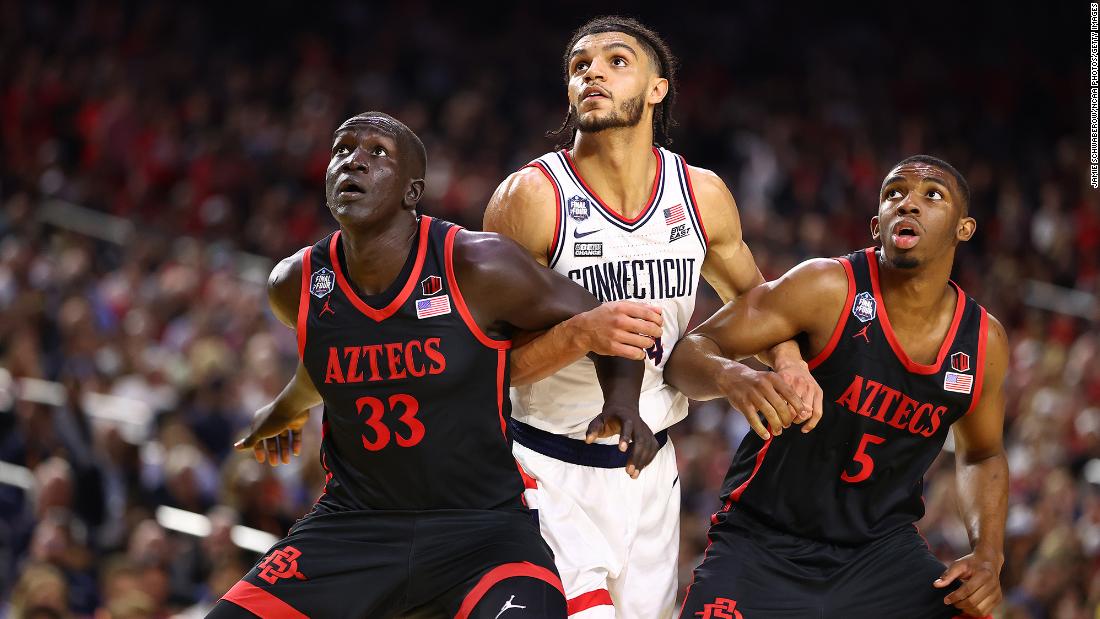 From left, San Diego State&#39;s Aguek Arop, UConn&#39;s Andre Jackson Jr. and Butler box out during a second-half free throw.