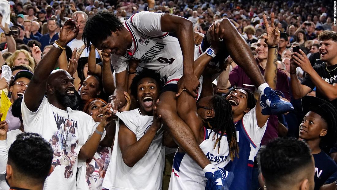 UConn&#39;s Tristen Newton is lifted in the postgame celebrations after the Huskies won the NCAA Tournament final on Monday, April 3.