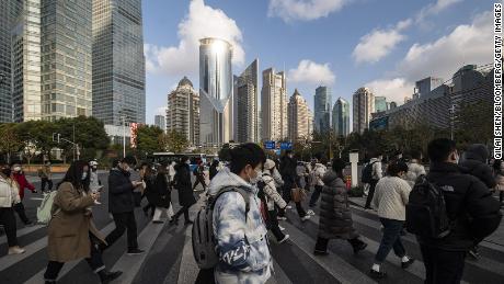 Pedestrians in Pudong&#39;s Lujiazui Financial District in Shanghai in January 2023. 