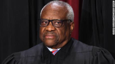 Associate US Supreme Court Justice Clarence Thomas poses for the official photo at the Supreme Court in Washington, DC on October 7, 2022.