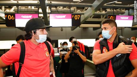 Ricardo Goulart, left, and Elkeson of Guangzhou Evergrande at an airport as they depart for Doha to attend the AFC Champions League on November 17, 2020 in Guangzhou, China. 