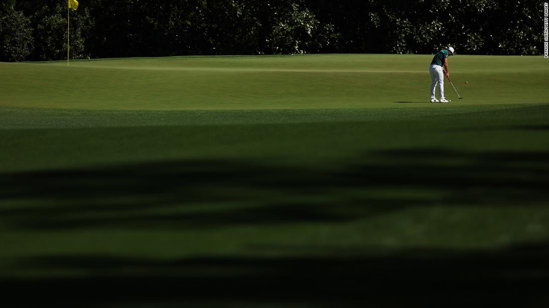 Viktor Hovland putts on the fifth green during the final round.