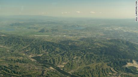 An aerial view of Riverside County, California -- green from recent snow and rain.