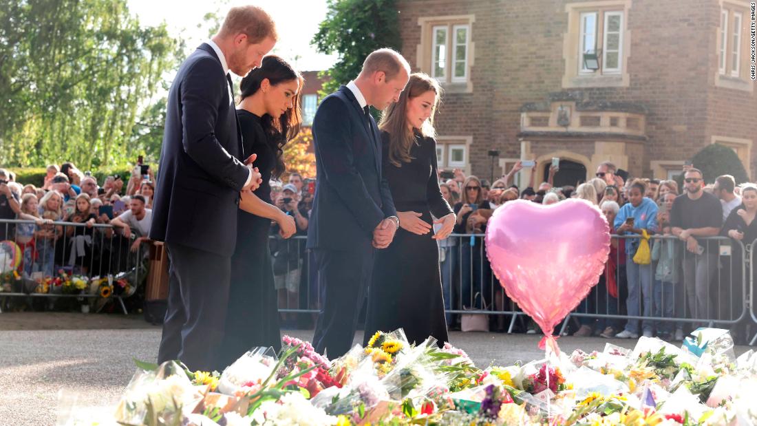 William and Catherine join Prince Harry and Meghan, the Duchess of Sussex, as they view tributes to Queen Elizabeth II outside Windsor Castle in September 2022. It was the first time the public had seen the two brothers together since the Queen&#39;s Platinum Jubilee celebrations.