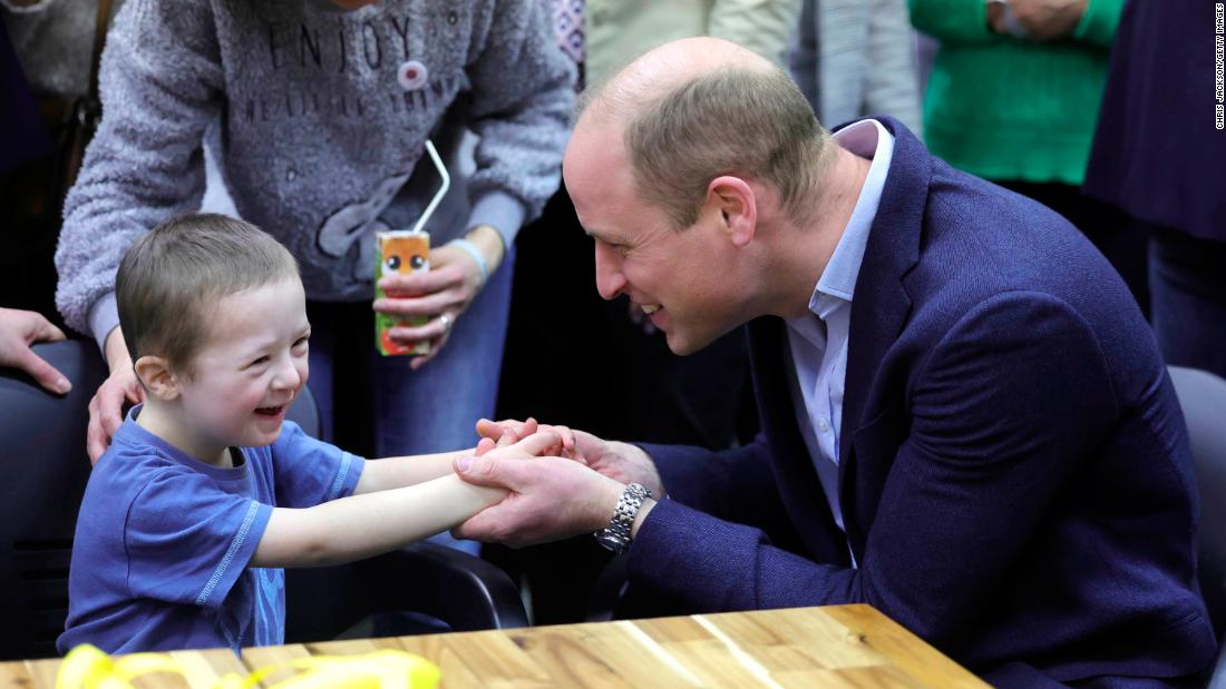 Prince William holds hands with Tymofii, a young Ukrainian refugee, during a &lt;a href=&quot;https://www.cnn.com/2023/03/22/europe/prince-william-poland-intl-gbr/index.html&quot; target=&quot;_blank&quot;&gt;visit to Warsaw, Poland,&lt;/a&gt; in March 2023.